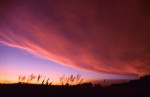 Photograph of a storm cloud forming over the Kansas Flint Hills